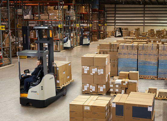 Crown reach truck in warehouse application for Bailey equipment rentals