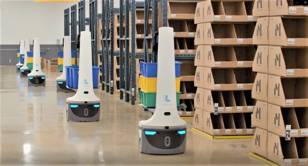 Autonomous mobile robots moving inventory in a warehouse
