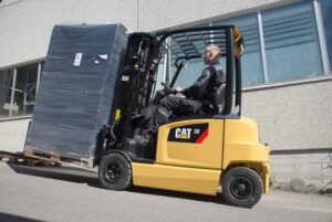 forklift moving electrical equipment used in large infrastructure and data center projects